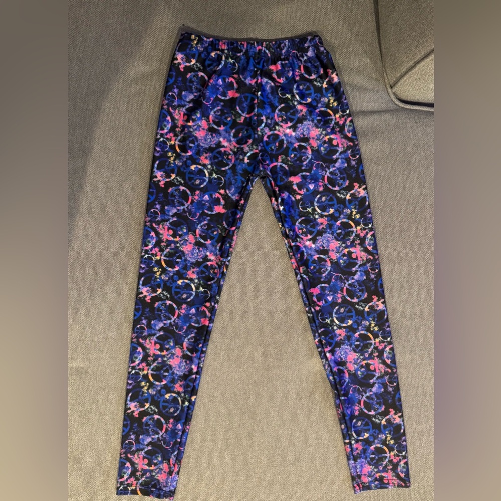 Girls Dori peace sign leggings. Size 12/14.